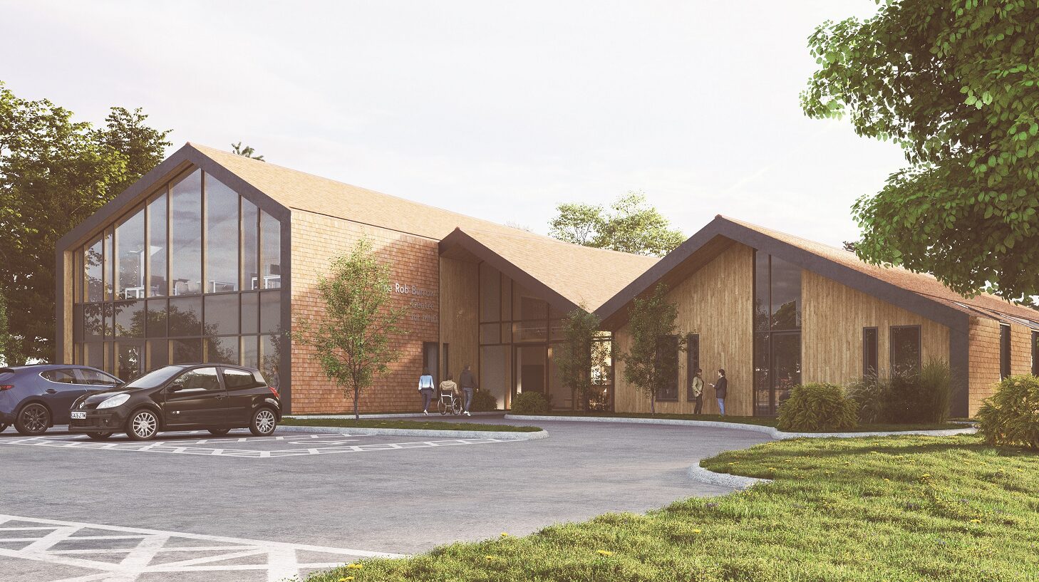 An artist's impression of the new Rob Burrow Centre for Motor Neurone Disease, showing a low building with a zig zag roofline, with a large glassed front.